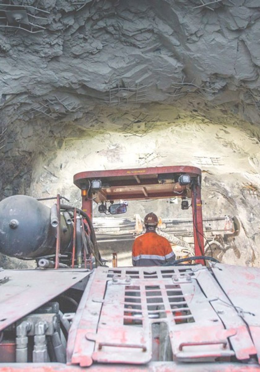 Man in mining vehicle